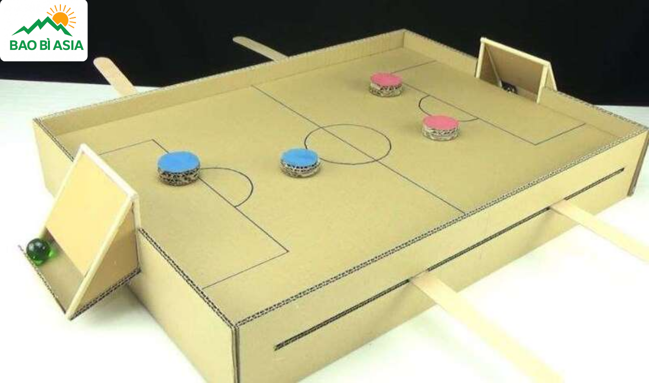 Làm bàn giấy carton chơi hockey