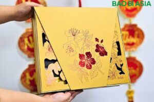 Hộp đựng yến mai đỏ nền vàng 33x36x10cm giấy Couche in 4 màu cán gân