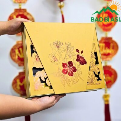 Hộp đựng yến mai đỏ nền vàng 33x36x10cm giấy Couche in 4 màu cán gân